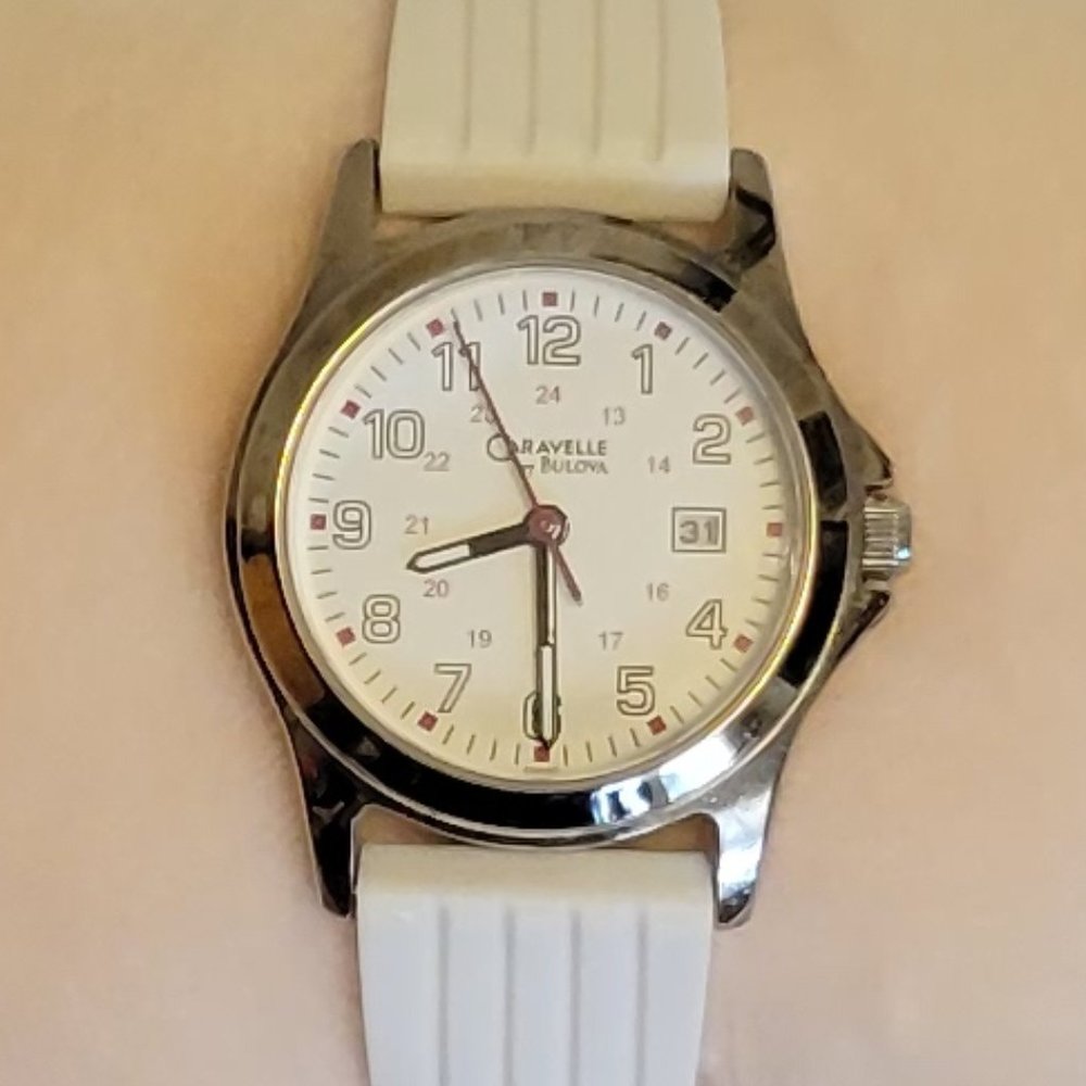 ❣️HP❣️ Bulova Caravelle stainless steel White Rubber Band Watch with Date.